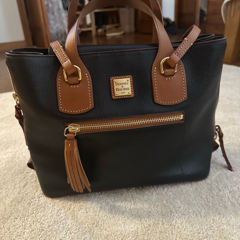 Dooney & Bourke Black and Tan Satchel with matching wallet.